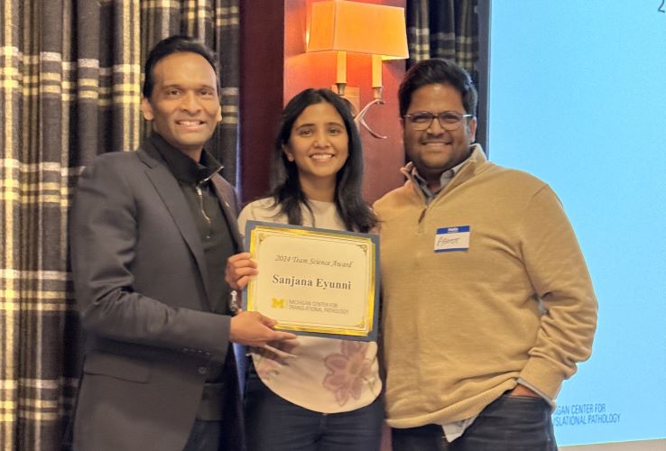 Sanjana Eyunni wins Team Science Award, with mentors Drs. Arul Chinnaiyan and Abhijit Parolia.